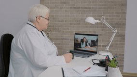 Nurse having video conference with colegues from different countries. Telemedicine between doctor and pharmacist explaining the properties of new medicine.