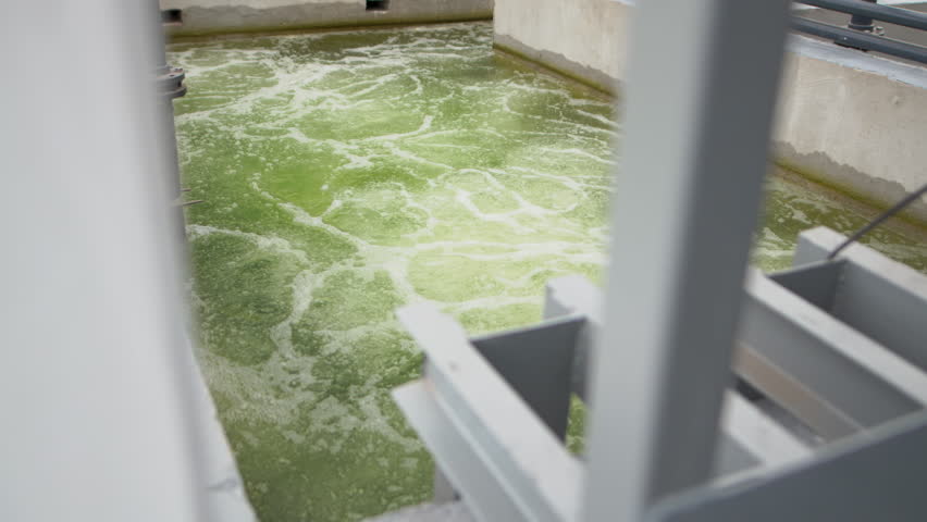 Biological treatment process in aeration basin closeup. Specialized equipment serves for breakdown of organic pollutants by infusion of oxygen