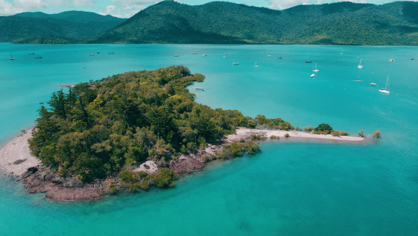 Close up Aerial Cinematic of Repair Island, Airlie beach, Holidays location.