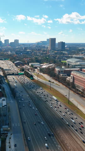 Downtown Atlanta, Georgia. Business center with Interstate 85 and general view of Georgia Institute of Technology. Aerial view. Vertical.