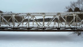 Small Bridge Over Frozen River Drone Footage