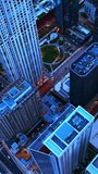 Excellent panorama of amazing Chicago skyscrapers in the evening. Beautiful district of metropolis from bird's eye view. Vertical video.