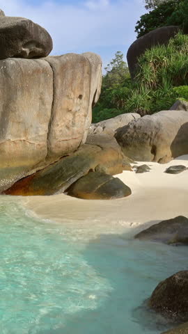 Paradise beach between rocks on Similan islands, Thailand. Vertical video Royalty-Free Stock Footage #3447452745