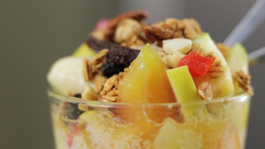 Static closeup view of a Fruit cocktail with bokeh background.