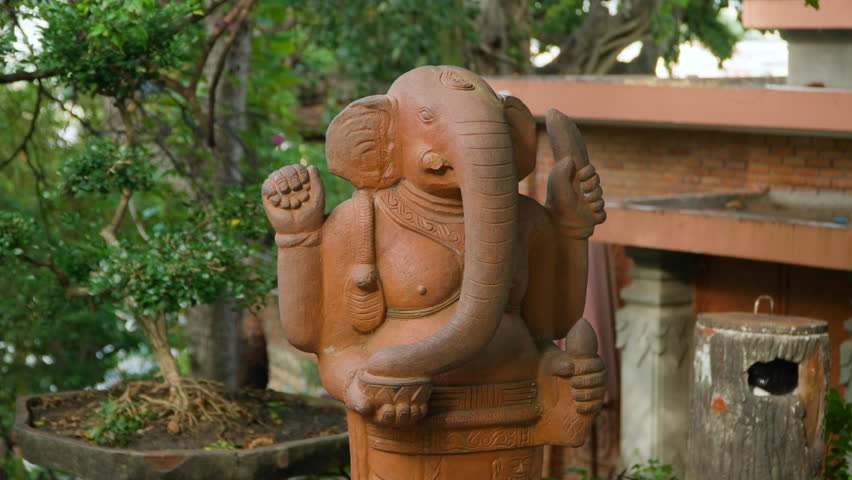 Orange Ganesha or Ganapati Statue in Po Nagar Cham Temple Garden, Nha Trang, Vietnam Royalty-Free Stock Footage #3447544297