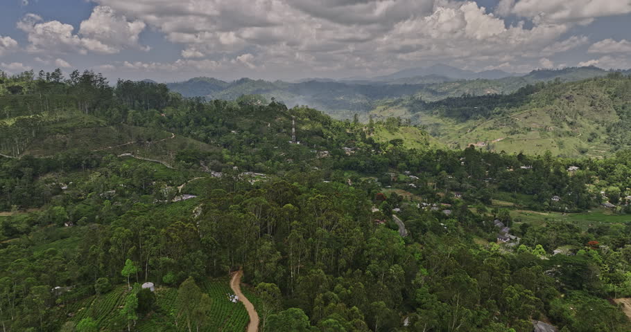 Mirahawatta Sri Lanka Aerial v3 drone flyover hillside village town capturing B44 road, residential houses, farmlands and Perawatta forest mountain views - Shot with Mavic 3 Cine - April 2023