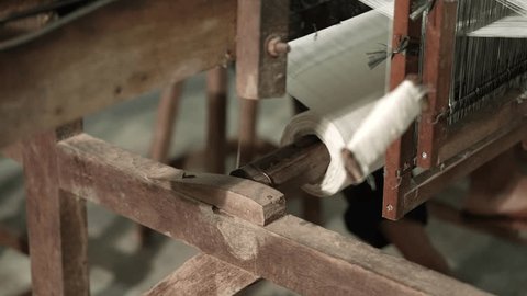 a close-up view of an old and still functional traditional loom Stockvideó
