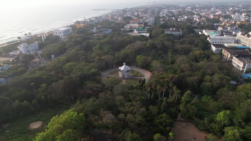 Aerial video of Bharathi Park Puducherry, also known as Pondycherry, one of the oldest French colonies has historic structures. Place de la République and Mahatma Gandhi Statue.