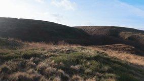 Video footage of the bleak and wild landscape of the Yorkshire moors. Pennines of England with rugged moorlands and lakes. Harsh winter landscapes of Britain