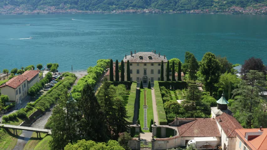 Villa balbiano, lush gardens, and lake como on a sunny day, aerial view Royalty-Free Stock Footage #3447663563