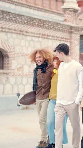 Multi-ethnic friends strolling together relaxed in the city Royalty-Free Stock Footage #3447776871