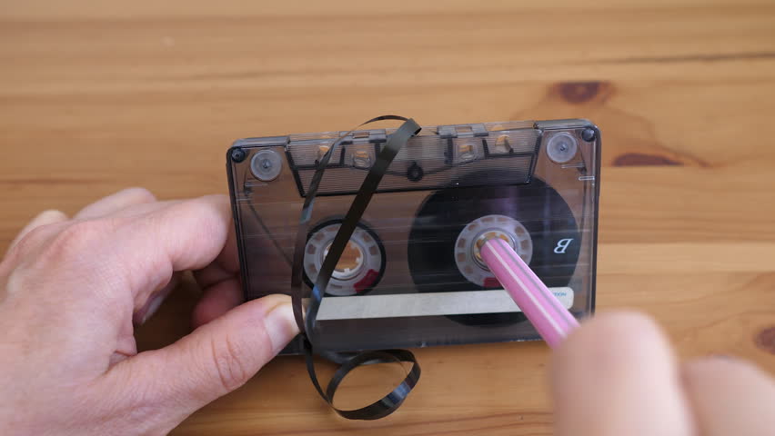 Cassette tape winding with a pen
