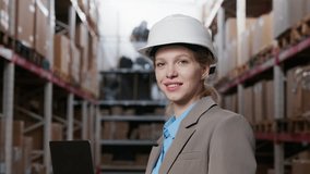 A girl works with a laptop in a warehouse - Powered by Shutterstock - Get 15% off with code: PIKWIZARD15
