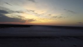 video a drone shot at sunrise over the large salt flats of cordoba : santiago del estero in argentina