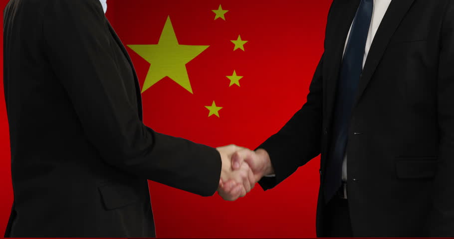 Animation of two caucasian businessmen shaking hands over flag of china. Chinese, business, agreement, politics and communication, digitally generated video.