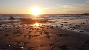 Coastal shoreline sunset beach scenery Swamis Reef Surf Park Encinitas California.
