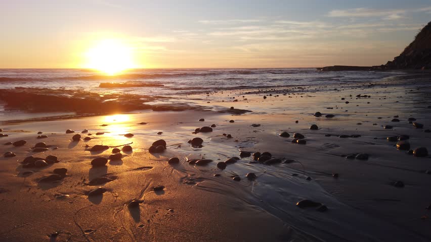 Southern California remote coastal sunset beach scene Swamis Reef Surf Park Encinitas California. Royalty-Free Stock Footage #3448310059