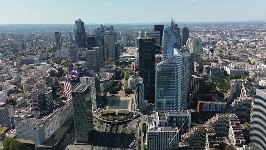Modern La Defense Parisian business financial district in Paris, France. Aerial drone orbiting