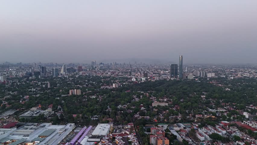 Hyperlapse of CDMX South, featuring pastel and purple hues, aerial views