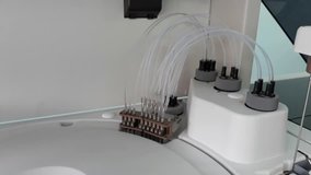 Video clip presenting the movement of automatic probes of the automatic chemistry analyzer/machine in laboratory room.