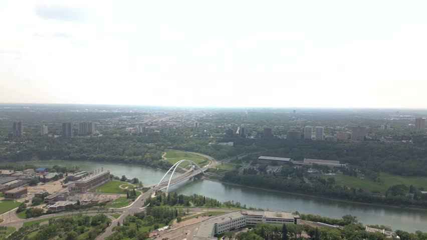 Edmonton, AB, Canada - Feb 28th,2024: City river bridge view from top.
