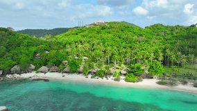 Koh Tao, Thailand, a serene escape with pristine beaches, swaying palm trees, and a laid-back atmosphere, ideal for relaxation and rejuvenation. Flying from drone. Beach background. 4K HDR.
