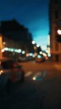 Exceptional footage capturing defocused scenes of summer city streets in an establishing shot - Vertical video