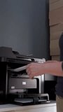 Woman Using Copy machine in Office, Office Worker Using Copy machine, Vertical Video