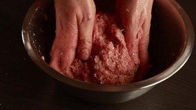  woman hands making minced meat close up