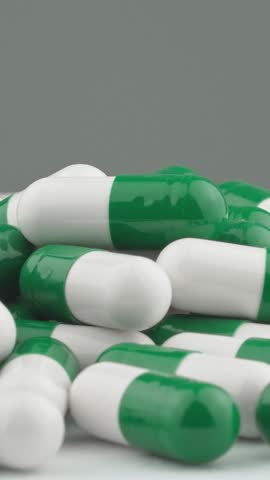 Vitamins and dietary supplements in one capsule. Pharmaceuticals and medicine: discovering the magic of healing capsules. Production of drugs and capsules in dietetics and sports nutrition.