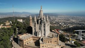 Aerial video of the Tibidabo church that overlooks the entire city of Barcelona. Spain
