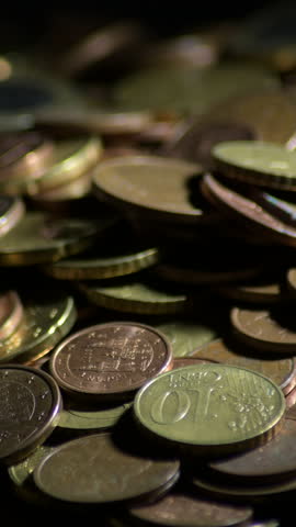 Euro coins gyrating, Vertical 4K