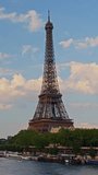 Vertical video: The Eiffel tower timelapse from bridge at the river Seine sunny summer day in Paris. France