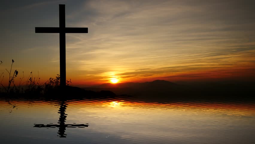 Cross Background Illuminates by the Sunset Rays