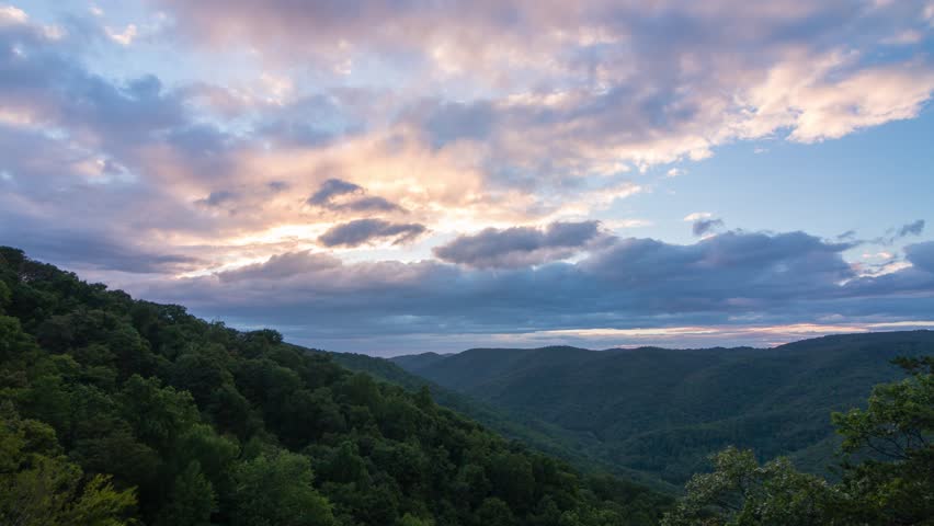 Sunset clouds over the green forest in Virginia, USA. | Shutterstock HD Video #34499359