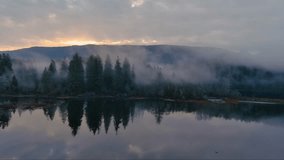 Fog Covered Trees by the Lake in Valley by Mountains. Canadian Nature Landscape. Aerial View, Background. Vancouver Island, BC Canada. - Powered by Shutterstock - Get 15% off with code: PIKWIZARD15