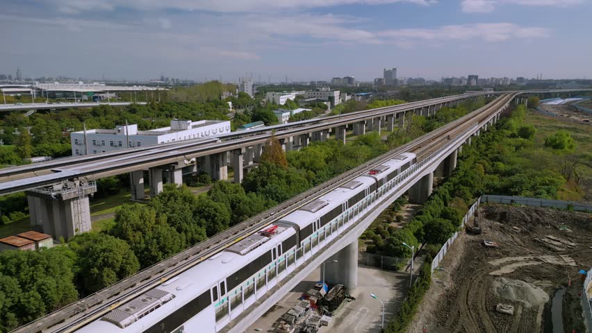 Shanghai magnetic levitation (maglev) train leaving for Pudong international airport. This train link Pudong international airport with Pudong downtown district.