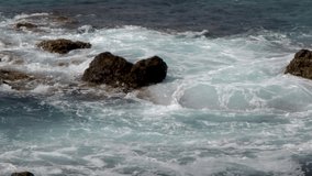 HD real time video of waves on rocks at Puerto de las Nieves, Gran Canaria