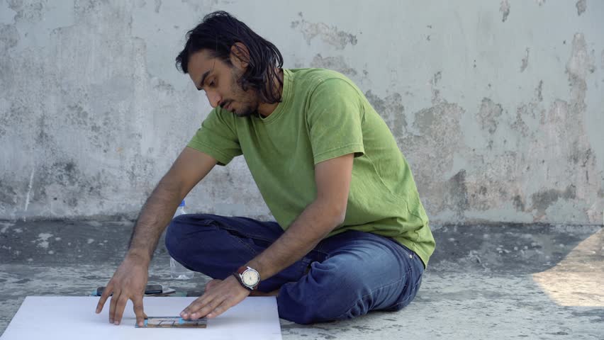 young male and female working on a group project in the roof . 