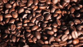 Dark coffee beans. Rotation. Coffee beans. Close up of coffee seeds. Beautiful coffee seeds. 4K