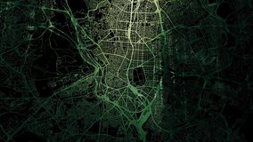 Zoom in road map of Madrid Spain with green glowing roads on a black background.