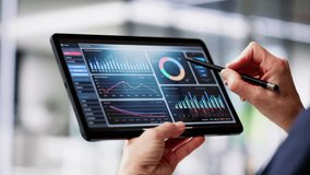 Businesswoman Using Analytics Data KPI Dashboard Tech - Powered by Shutterstock - Get 15% off with code: PIKWIZARD15