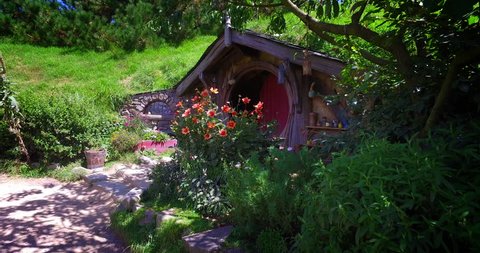 NEW ZEALAND – MARCH 2016 : Video shot of Hobbiton village on a beautiful day with hobbit house in view