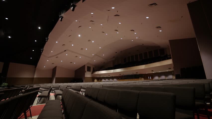 Large Empty Auditorium Filled With Chairs Wide Angle