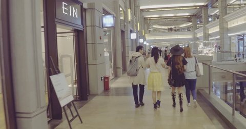 SHANGHAI, CHINA – JUNE 2016 : Video shot of people walking in shopping mall