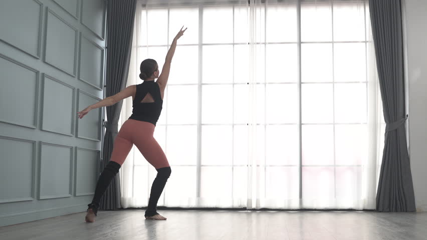 Ballet dancer practice at studio. Entertainment and skill.