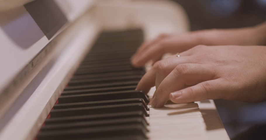 Close Up Of A Female Hands Playing Piano Royalty-Free Stock Footage #3450736463