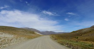 NEW ZEALAND – MARCH 2016 : Video shot of driving through Mount Cook National Park on a beautiful day with road in view