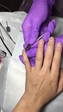 Manicure process the device removes the cuticle video hd vertical