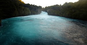 NEW ZEALAND – MARCH 2016 : Aerial shot over Huka Falls at sunset with Waikato River in view
